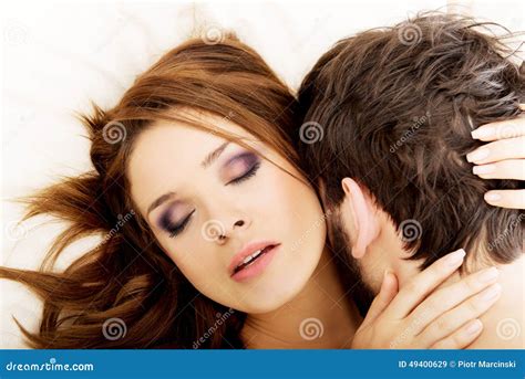 sex hug kiss|Hot couple passionately kissing and undressing in bedroom.